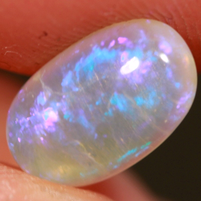 SOLID CRYSTAL OPAL Transparent with rich purple throughout
